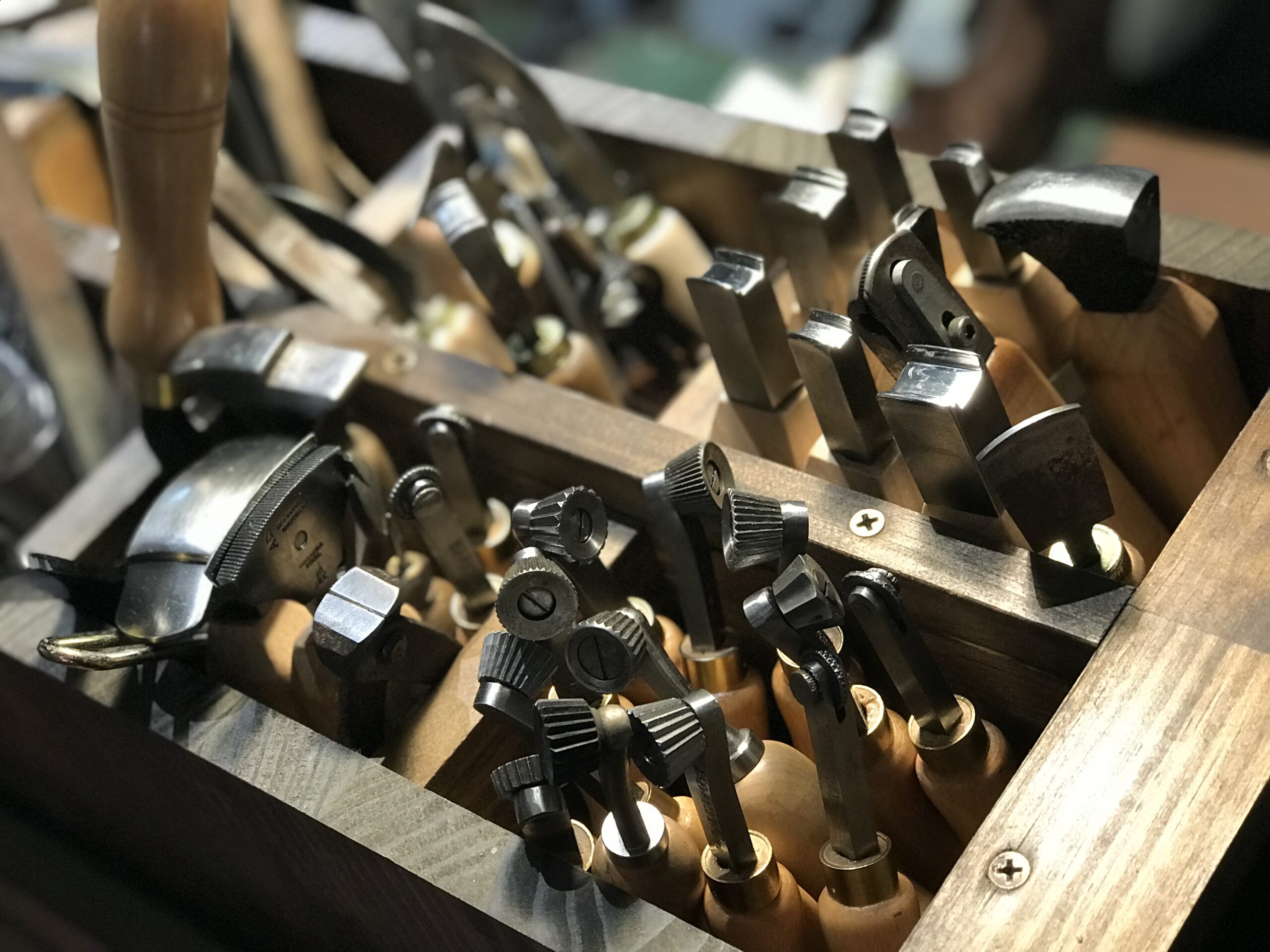 Tools in a shoemaker’s workshop illustrating dress shoe construction methods