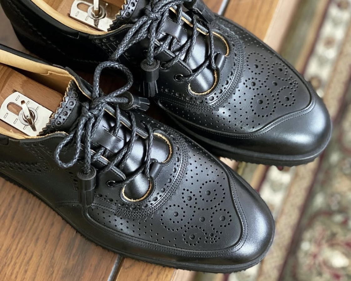 Leather sneaker with dressy details—an MTO model extending bespoke sensibility to daily wear