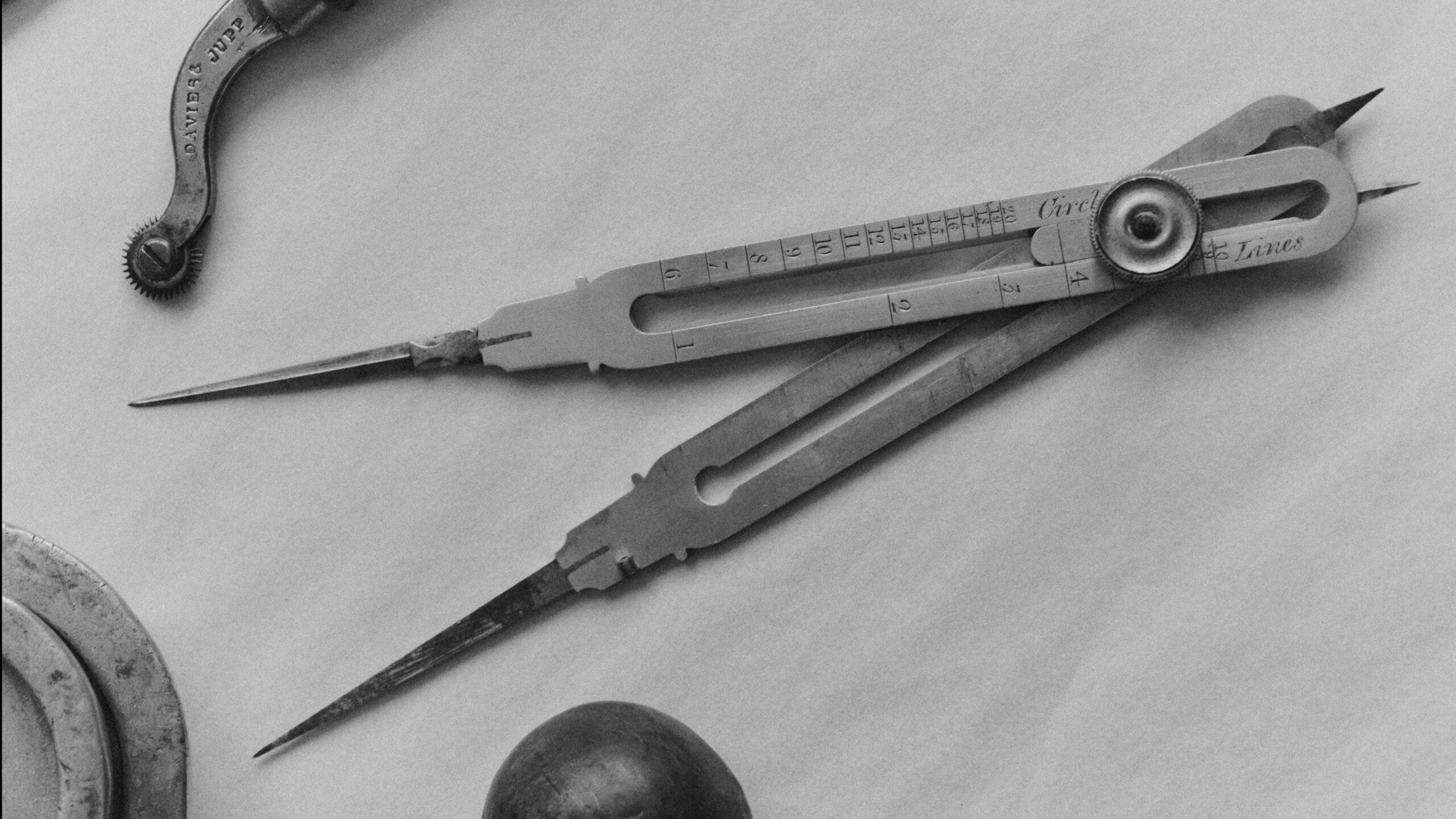 A panoramic view of Laborde’s workshop—tools, lasts, and leathers mapping a decade of study.