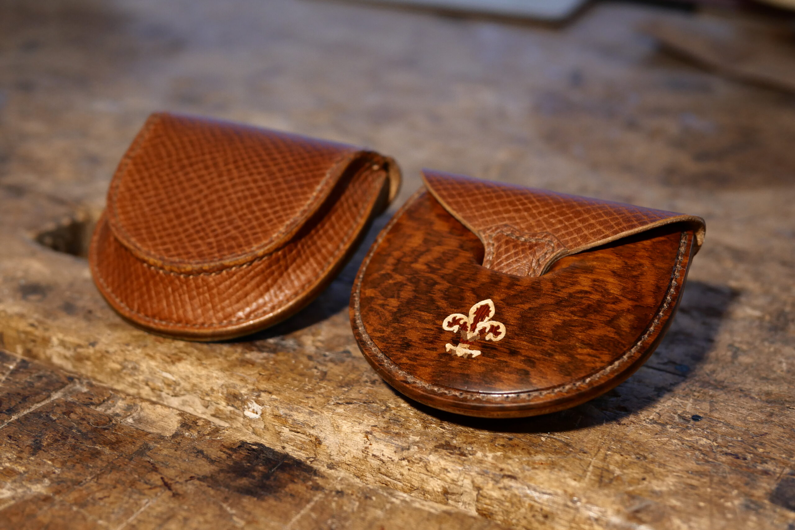 Coin case with wood inlay and leather — compact example of marquetry craft